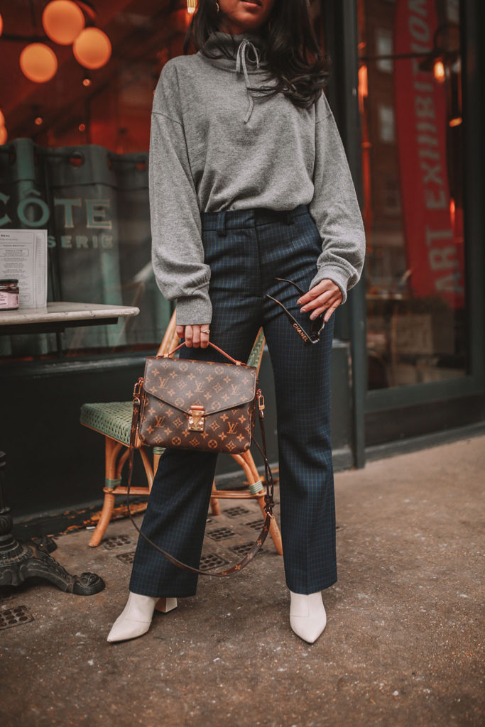 Luxury fashion blogger Shloka Narang of The Silk Sneaker shares what to wear to work in winter for stylish office outfits featuring Sandro and Louis Vuitton