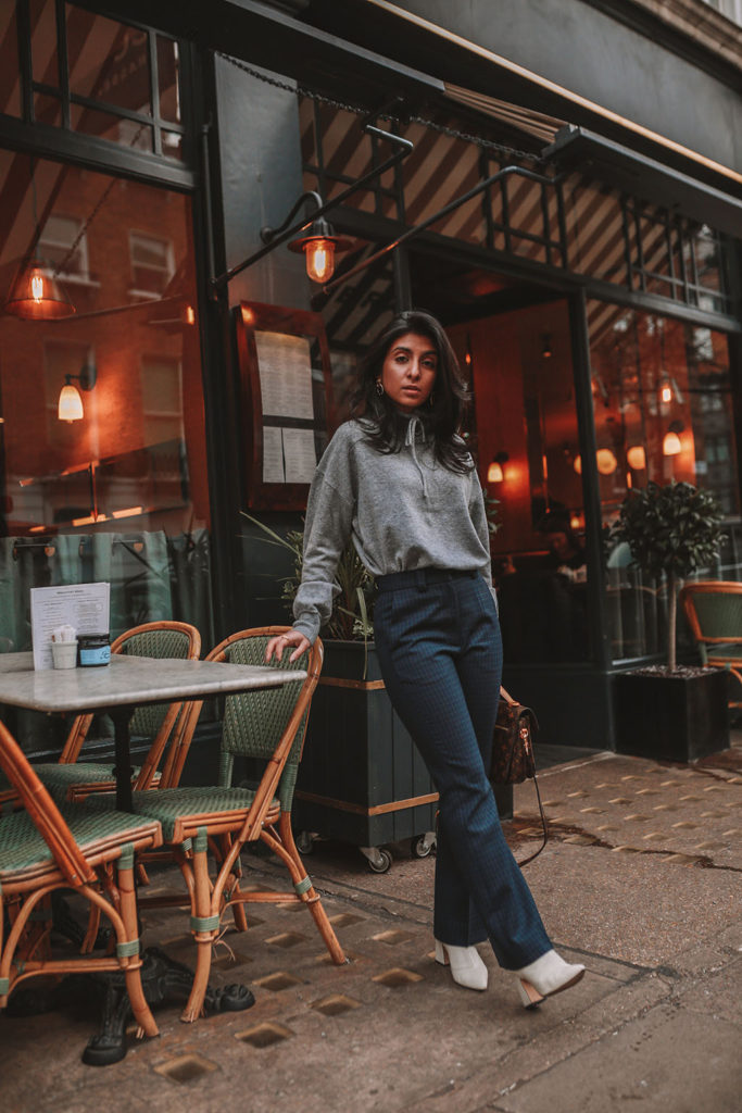 Luxury fashion blogger Shloka Narang of The Silk Sneaker shares what to wear to work in winter for stylish office outfits featuring Sandro and Louis Vuitton