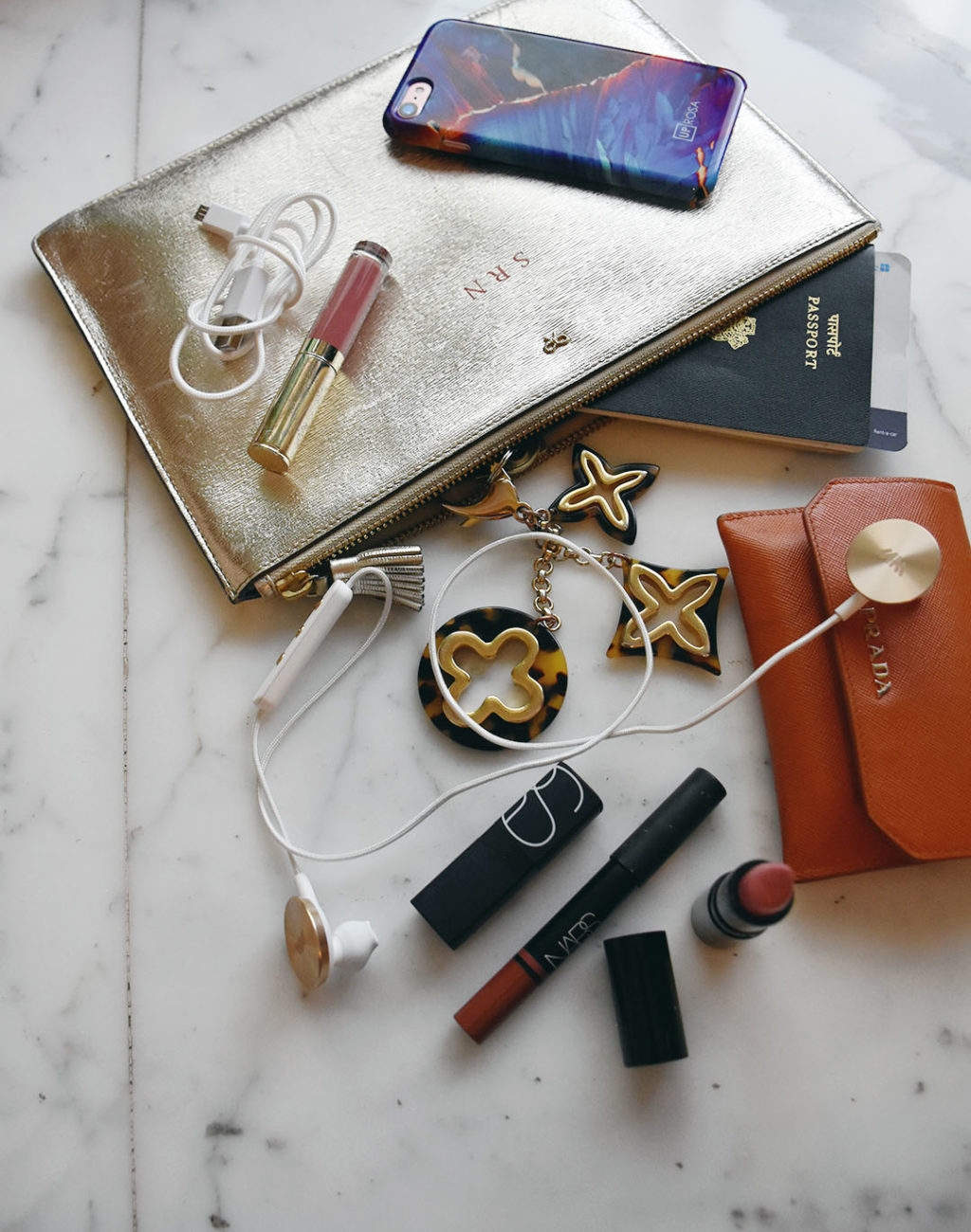 Fashion blogger Shloka Narang of The Silk Sneaker shares her carry on packing essentials and how to pack for a long haul flight