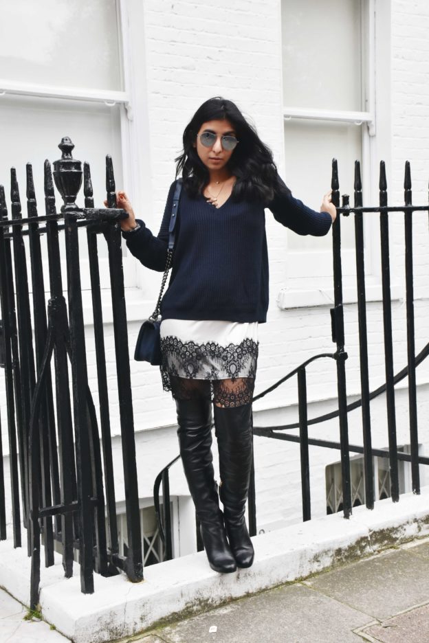 Fashion blogger Shloka Narang of The Silk Sneaker wears a Brandy Melville Sweater and Topshop Lace Slip dress to show how to layer this winter