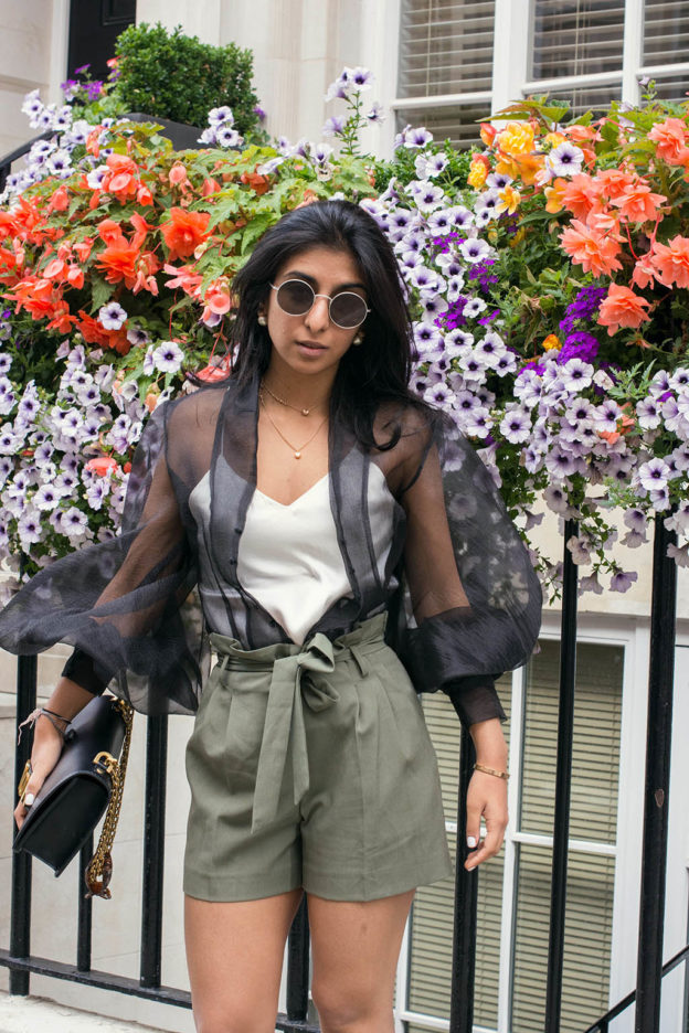 Fashion blogger Shloka Narang of The Silk Sneaker showcases how to wear a sheer top