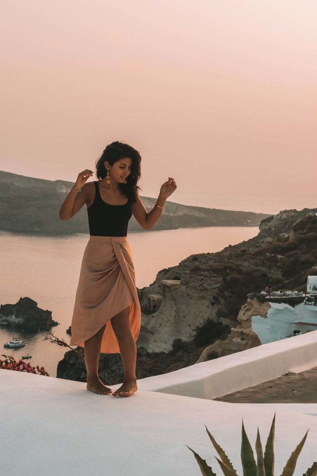 Fashion blogger Shloka Narang of The Silk Sneaker showcases how to look glamorous on your holiday with Wolford in Santorini