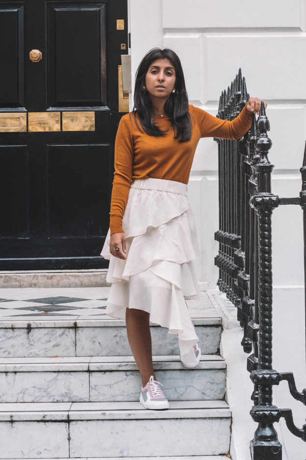Fashion blogger Shloka Narang of The Silk Sneaker creates a stunning autumn outfit transitioning the summer skirt into autumn with Isabel Marant, Uniqlo and Amazon Find