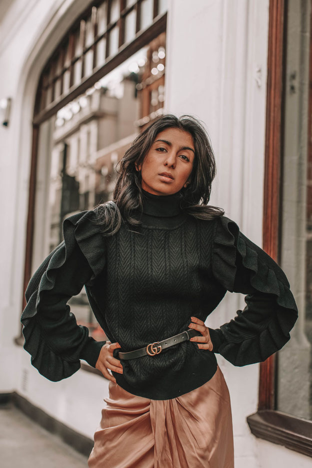 Fashion blogger Shloka Narang of The Silk Sneaker showcases how to wear a summer skirt in winter