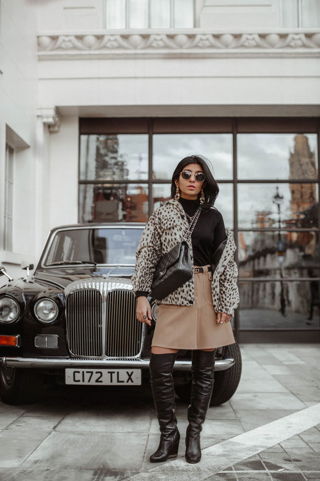 Fashion blogger Shloka Narang of The Silk Sneaker shares how to style a leopard print coat featuring By Malene Birger, Maje and Chanel