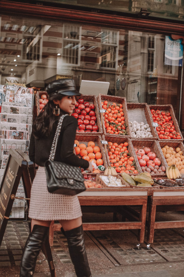 Fashion blogger Shloka Narang of The Silk Sneaker showcases a spring outfit idea with a tweed skirt from Topshop