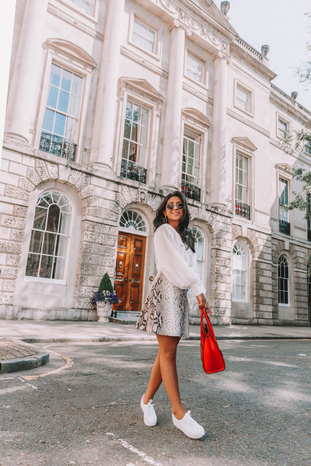 Fashion blogger Shloka Narang of The Silk Sneaker shares the summer blouse you need to create a cute summer outfit featuring ba&sh, Celine and Ray-Ban