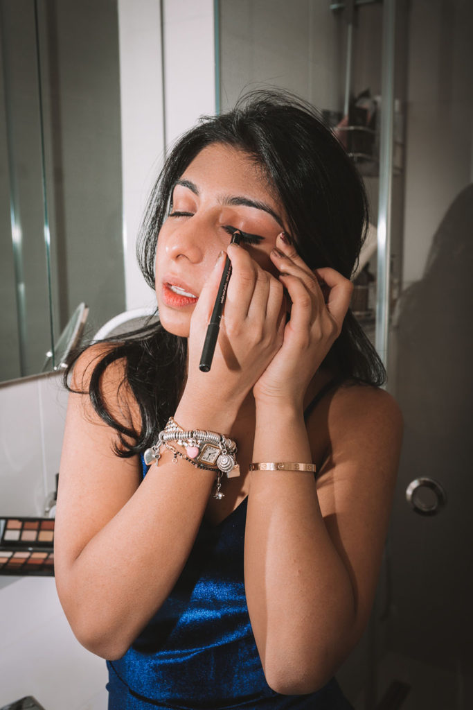 Luxury beauty and fashion blogger Shloka Narang of The Silk Sneaker shares an easy smokey eye tutorial for a holiday party makeup look featuring Armani Beauty