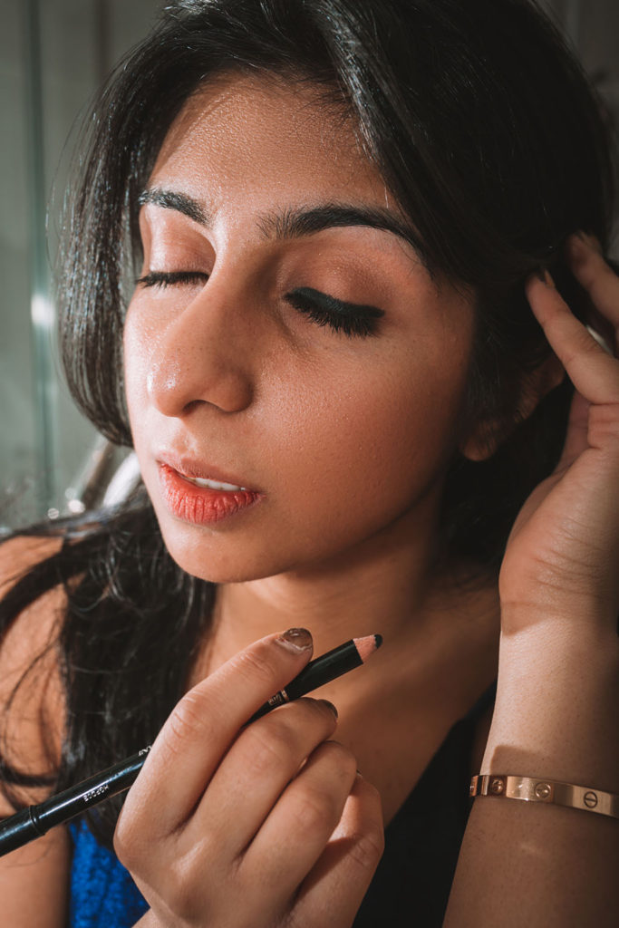 Luxury beauty and fashion blogger Shloka Narang of The Silk Sneaker shares an easy smokey eye tutorial for a holiday party makeup look featuring Armani Beauty
