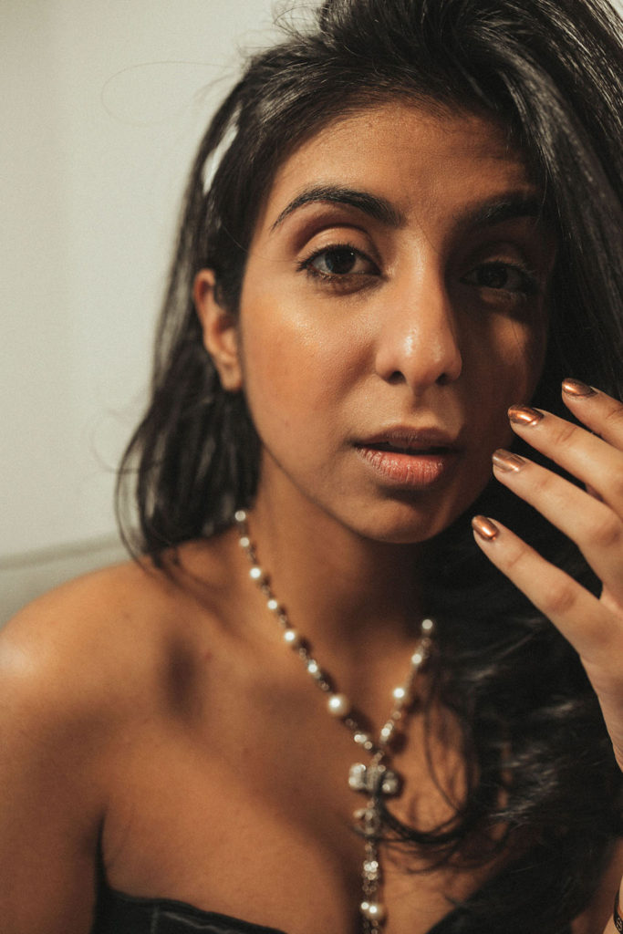 Luxury fashion and beauty blogger Shloka Narang of The Silk Sneaker shares three unique holiday party looks inspired by Chanel holiday makeup using Chanel Christmas makeup collection