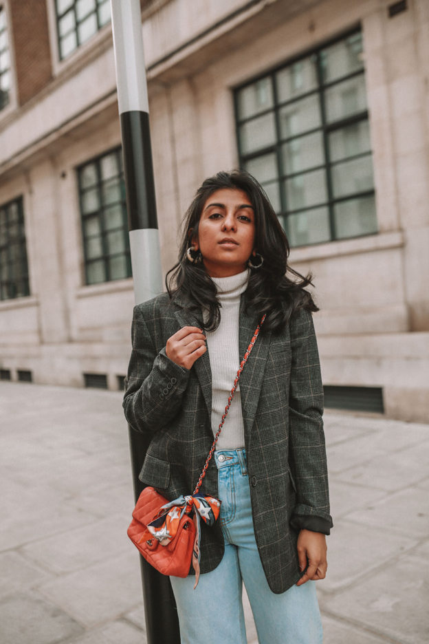 Luxury fashion blogger Shloka Narang of The Silk Sneaker shares three tips to elevate a simple winter outfit to make it more stylish featuring Chanel, Topshop and Zara