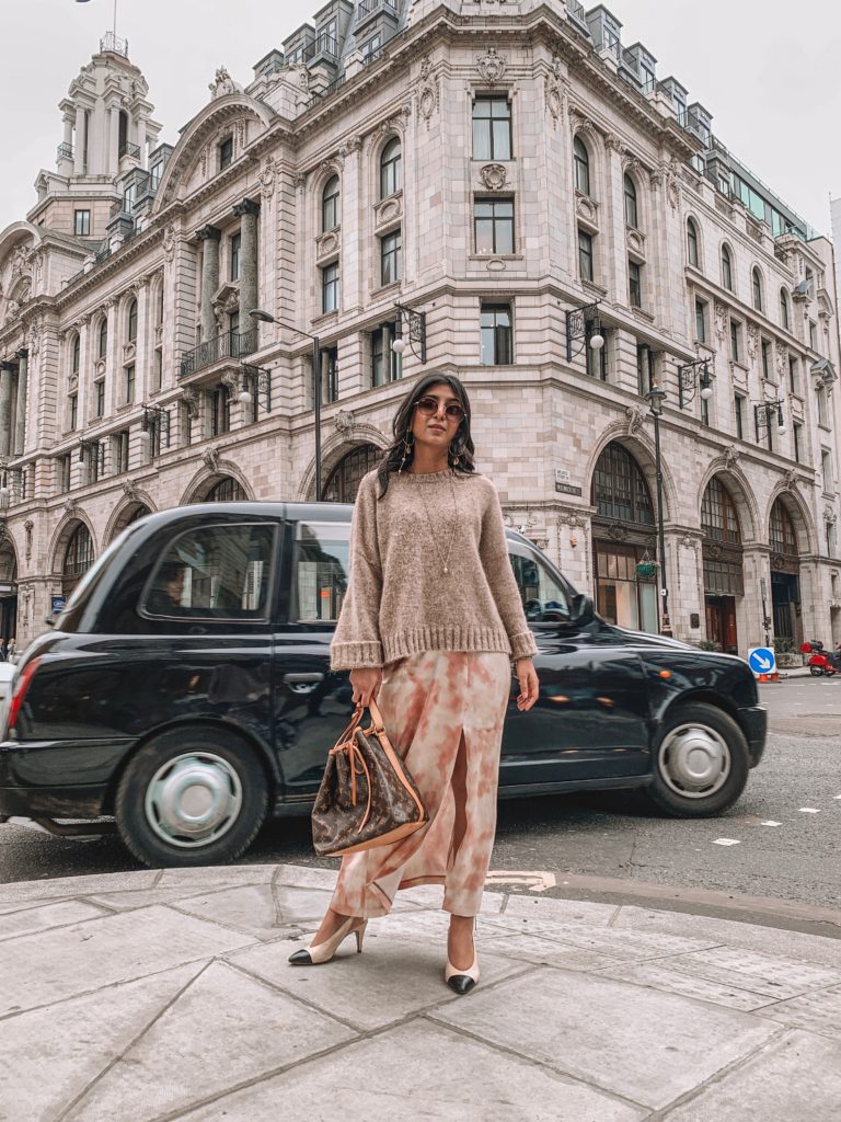 Fashion blogger Shloka Narang of The Silk Sneaker showcases her London Fashion Week Street Style looks for 2019 including neon, tie dye, silk slip skirts and the Dior Saddle Bag