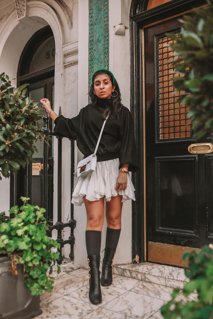 Luxury fashion blogger Shloka Narang of The Silk Sneaker showcases a spring outfit with her tips on how to get ready faster in the morning with Givenchy, Storets and Prada Headband