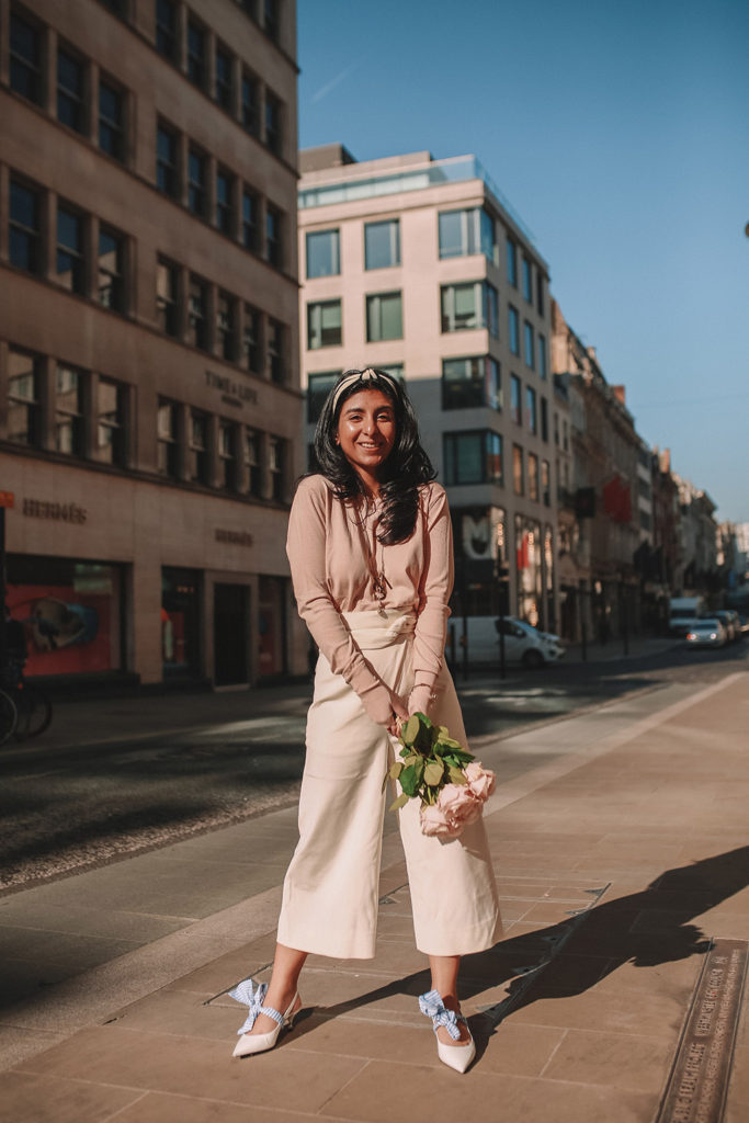 Luxury fashion blogger Shloka Narang of The Silk Sneaker shares her tips on how to dress Parisian in a cute spring outfit featuring Tibi and Prada