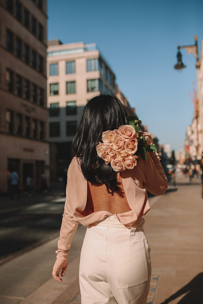 Luxury fashion blogger Shloka Narang of The Silk Sneaker shares her tips on how to dress Parisian in a cute spring outfit featuring Tibi and Prada