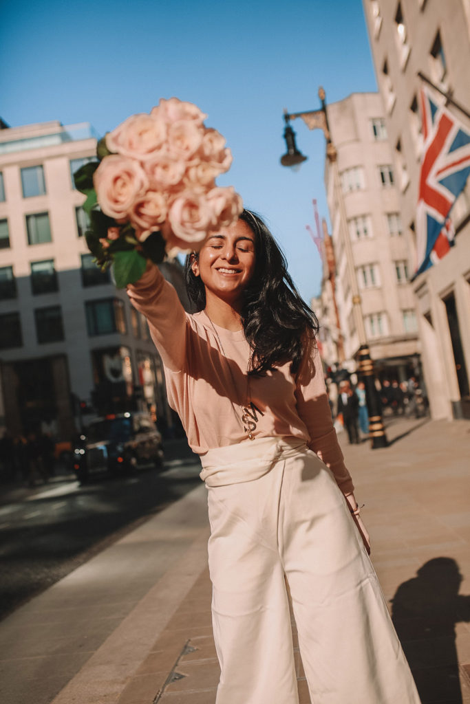 Luxury fashion blogger Shloka Narang of The Silk Sneaker shares her tips on how to dress Parisian in a cute spring outfit featuring Tibi and Prada