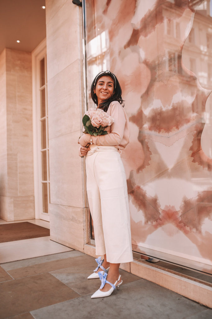 Luxury fashion blogger Shloka Narang of The Silk Sneaker shares her tips on how to dress Parisian in a cute spring outfit featuring Tibi and Prada