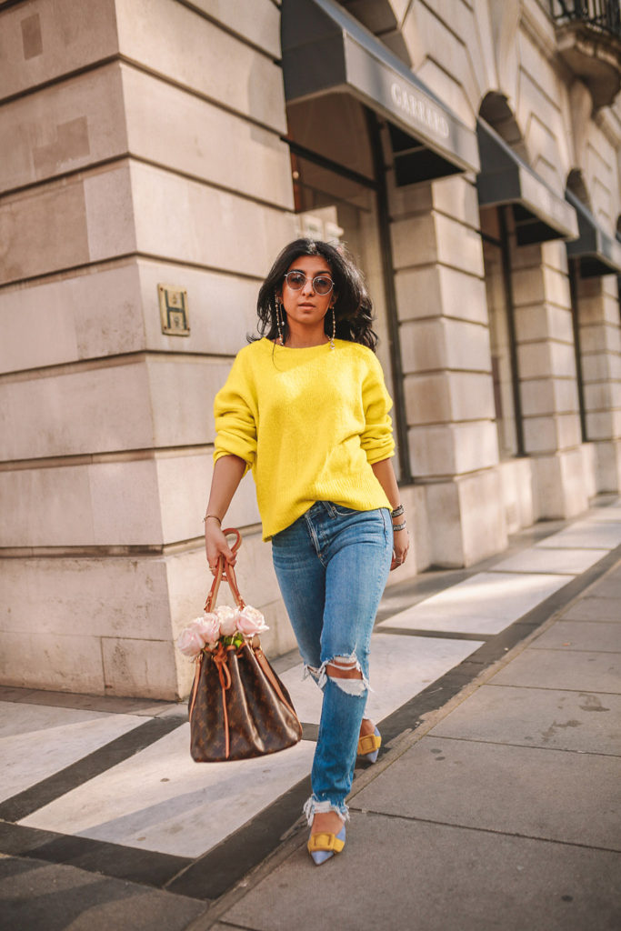 Luxury fashion blogger Shloka Narang of The Silk Sneaker shares how to wear neon in a spring outfit for every day featuring Zara, Paige and Louis Vuitton