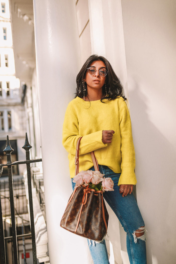 Luxury fashion blogger Shloka Narang of The Silk Sneaker shares how to wear neon in a spring outfit for every day featuring Zara, Paige and Louis Vuitton