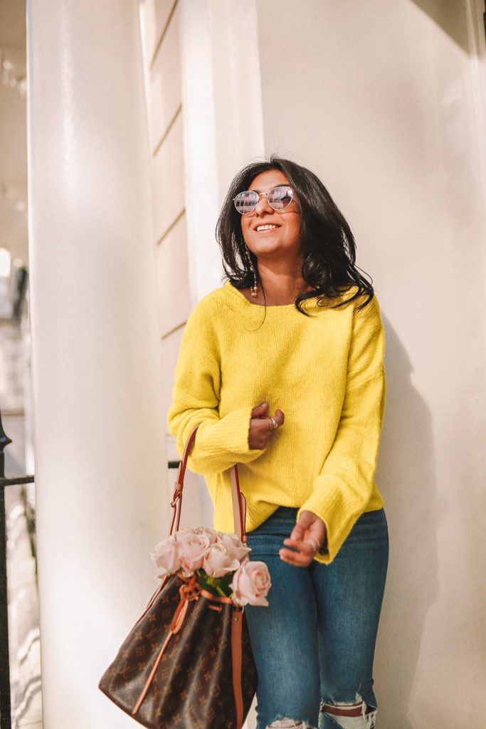Luxury fashion blogger Shloka Narang of The Silk Sneaker shares how to wear neon in a spring outfit for every day featuring Zara, Paige and Louis Vuitton