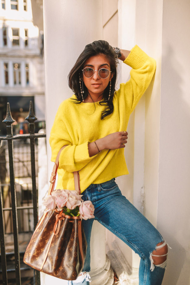 Luxury fashion blogger Shloka Narang of The Silk Sneaker shares how to wear neon in a spring outfit for every day featuring Zara, Paige and Louis Vuitton
