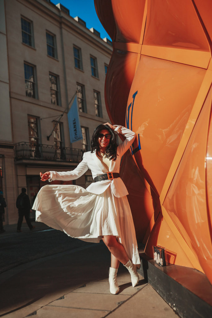 Luxury fashion blogger Shloka Narang of The Silk Sneaker shares her take on how to wear an elegant all white outfit for a chic spring look featuring Dior