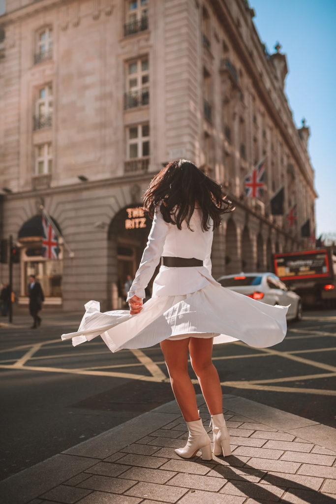 Luxury fashion blogger Shloka Narang of The Silk Sneaker shares her take on how to wear an elegant all white outfit for a chic spring look featuring Dior