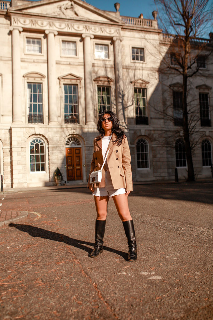 Luxury fashion blogger Shloka Narang of The Silk Sneaker shares how to style white denim shorts for a cute summer outfit featuring Topshop, & Other Stories and Dior