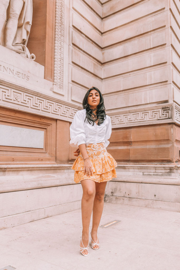 Luxury fashion blogger Shloka Narang of The Silk Sneaker shares how to create a cute and casual summer outfit with the best mini skirts for summer