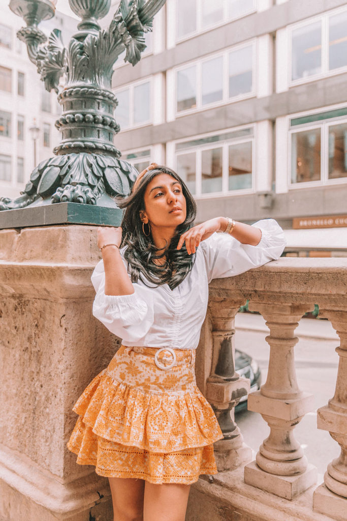 Luxury fashion blogger Shloka Narang of The Silk Sneaker shares how to create a cute and casual summer outfit with the best mini skirts for summer