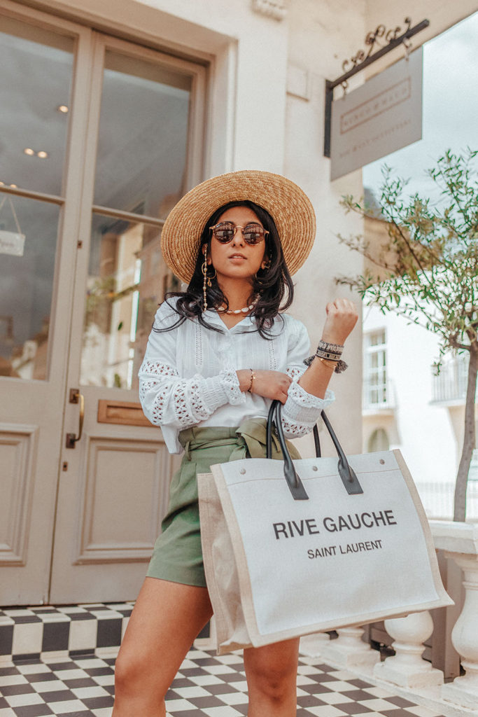 Luxury fashion blogger Shloka Narang of The Silk Sneaker shares how to wear shell jewellery and beach accessories for a cute city outfit featuring YSL and & Other Stories