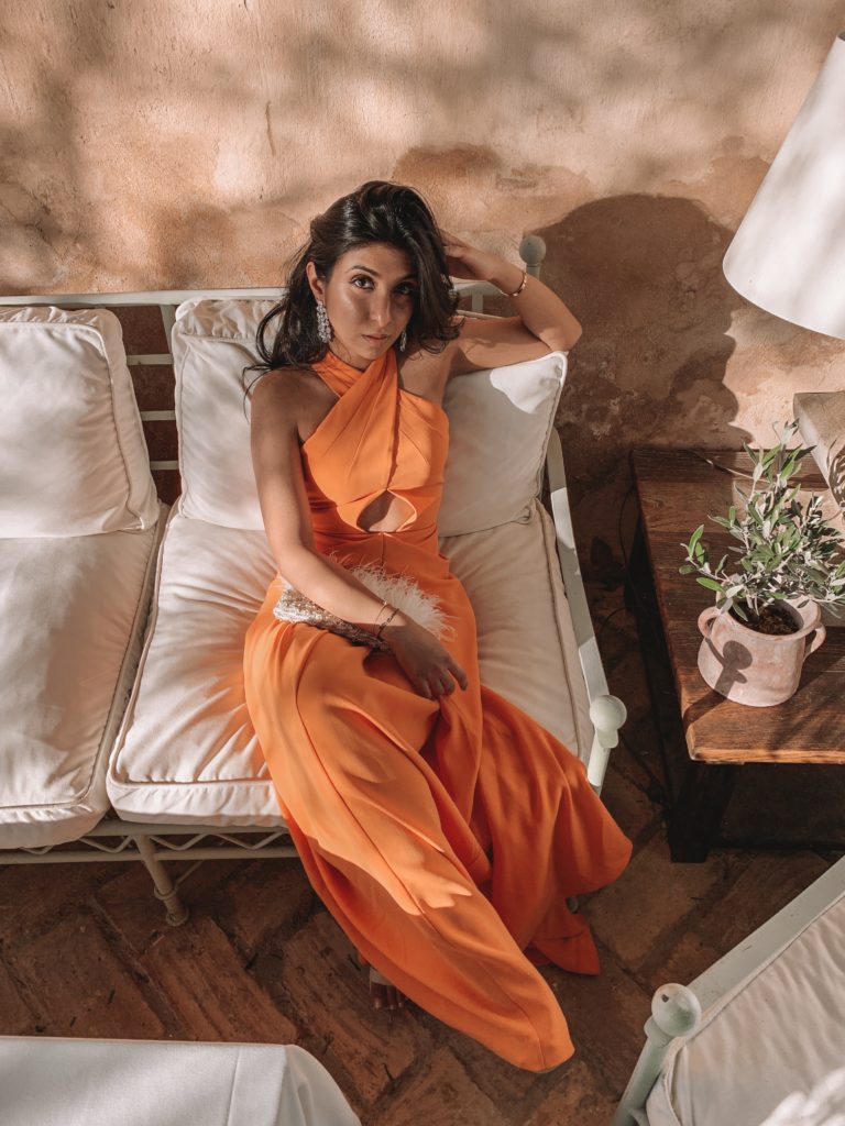 Fashion blogger Shloka Narang of The Silk Sneaker shares her Seville Travel Diary featuring luxury Indian brand Monisha Jaising and Reformation at a summer wedding
