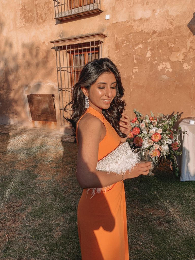Fashion blogger Shloka Narang of The Silk Sneaker shares her Seville Travel Diary featuring luxury Indian brand Monisha Jaising and Reformation at a summer wedding
