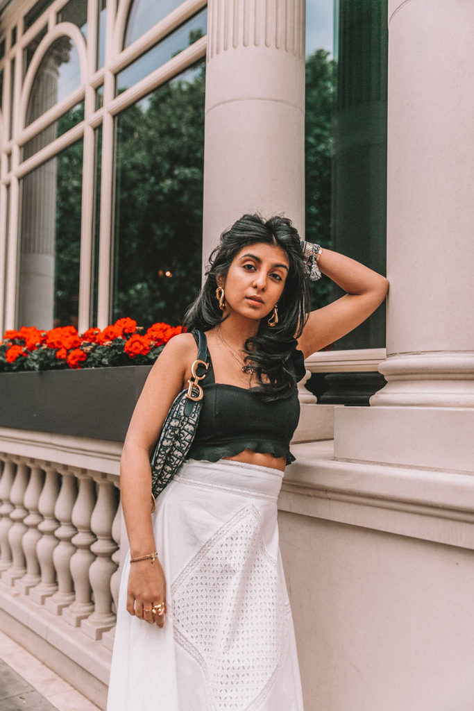 Luxury fashion blogger Shloka Narang of The Silk Sneaker shares her tips on how to style chunky summer sandals for cute and casual summer outfits featuring Prada, Dior and Topshop