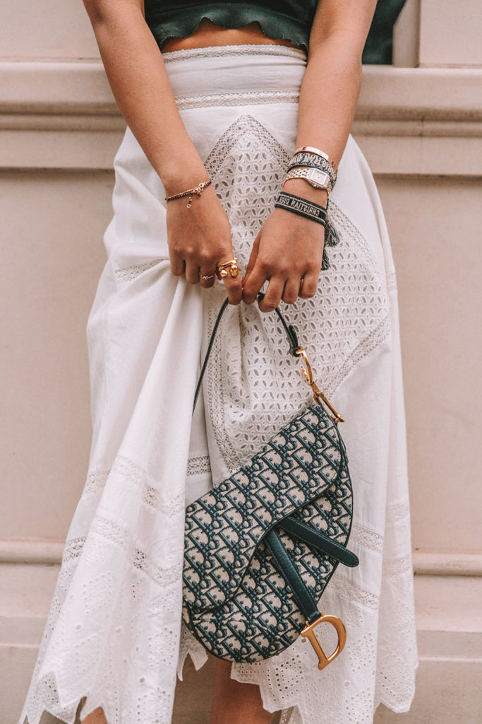 Luxury fashion blogger Shloka Narang of The Silk Sneaker shares her tips on how to style chunky summer sandals for cute and casual summer outfits featuring Prada, Dior and Topshop
