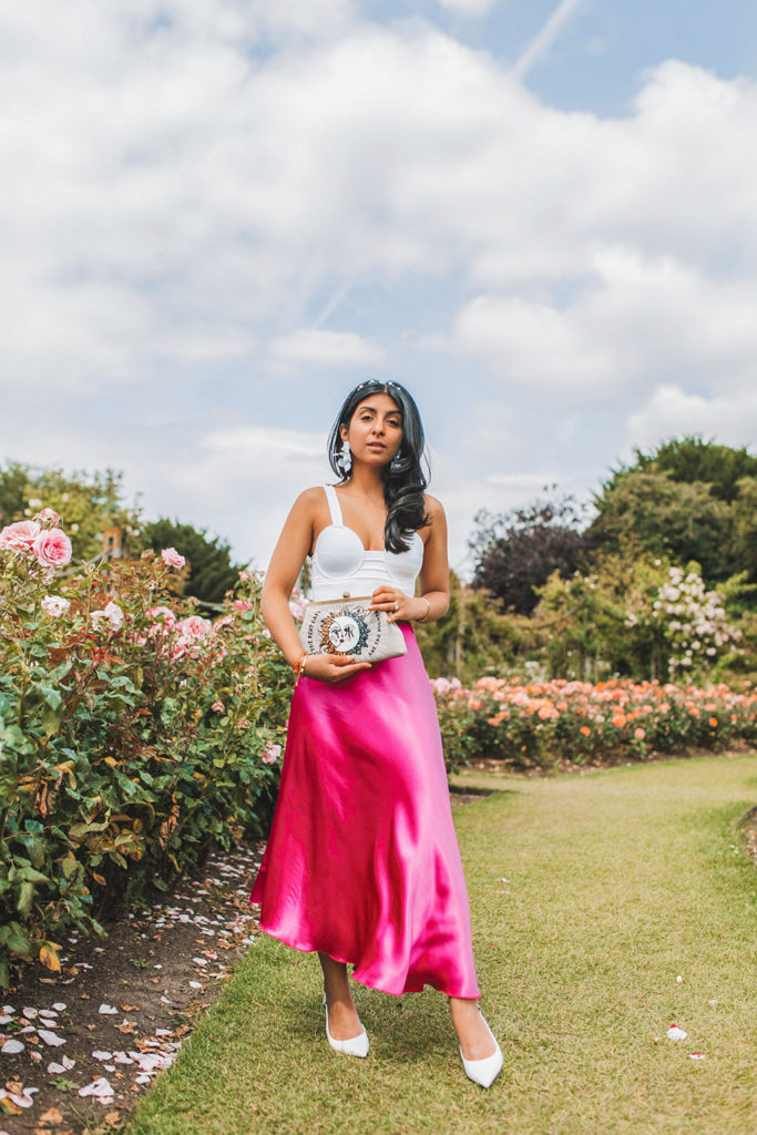 Luxury fashion blogger of the silk sneaker shares a slip skirt outfit in a satin midi skirt from & Other Stories and Lele Sadoughi earrings