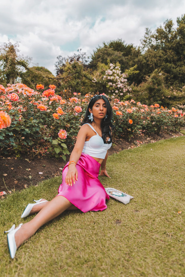 Luxury fashion blogger of the silk sneaker shares a slip skirt outfit in a satin midi skirt from & Other Stories and Lele Sadoughi earrings