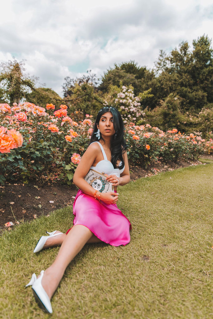 Luxury fashion blogger of the silk sneaker shares a slip skirt outfit in a satin midi skirt from & Other Stories and Lele Sadoughi earrings