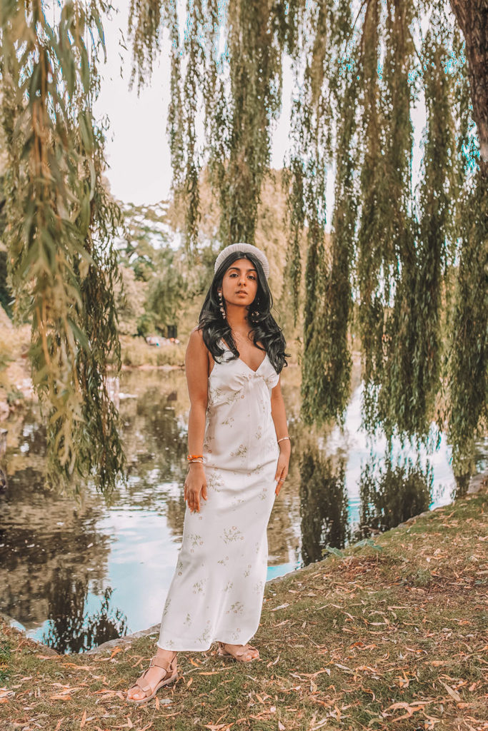 Luxury fashion influencer and blogger Shloka Narang of The Silk Sneaker shares how to style a slip dress for summer and autumn outfits in Topshop and Bluetiful Milano