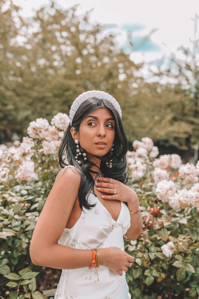 Luxury fashion influencer and blogger Shloka Narang of The Silk Sneaker shares how to style a slip dress for summer and autumn outfits in Topshop and Bluetiful Milano
