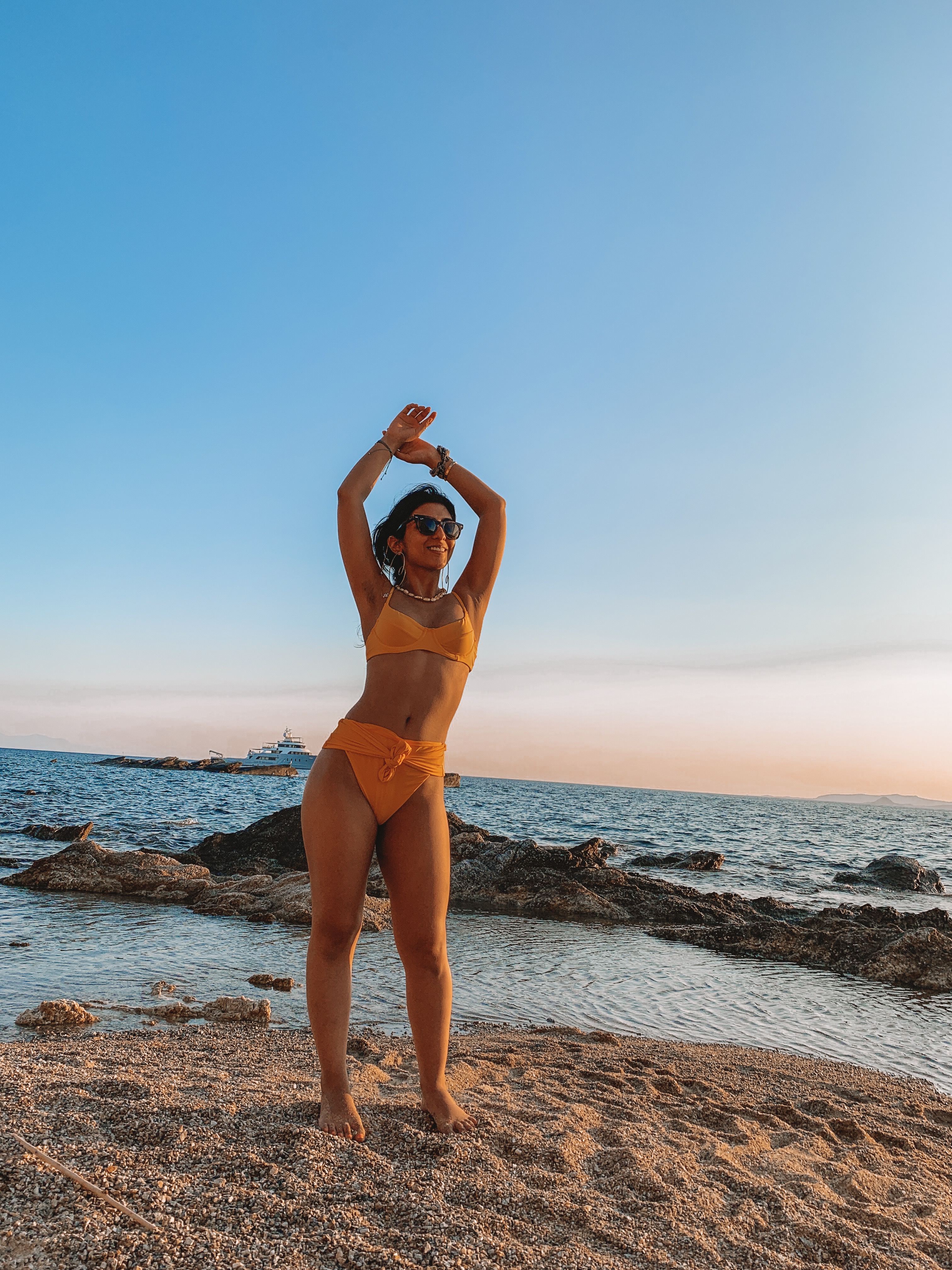 Luxury fashion and travel blogger Shloka Narang of The Silk Sneaker shares her guide to what to do in Mykonos