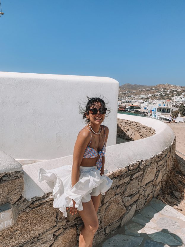 Luxury fashion and travel blogger Shloka Narang of The Silk Sneaker shares her guide to what to do in Mykonos