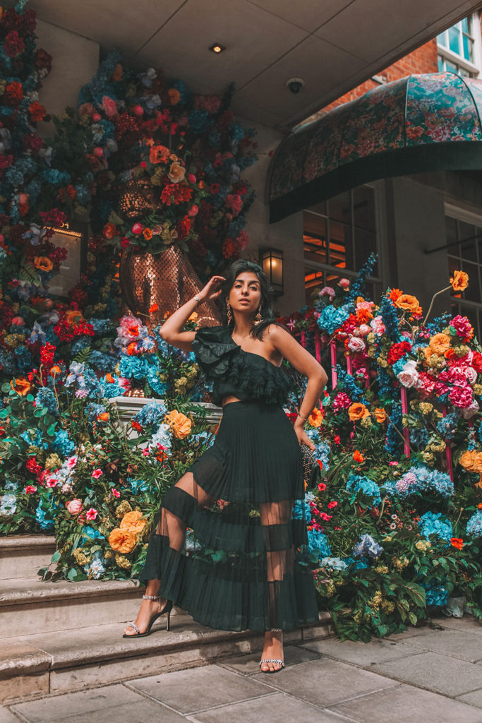 Luxury fashion blogger Shloka Narang of The Silk Sneaker shares her favourite luxe looking high street pieces in an all black outfit for fall outfit ideas featuring Jimmy Choo and & Other Stories