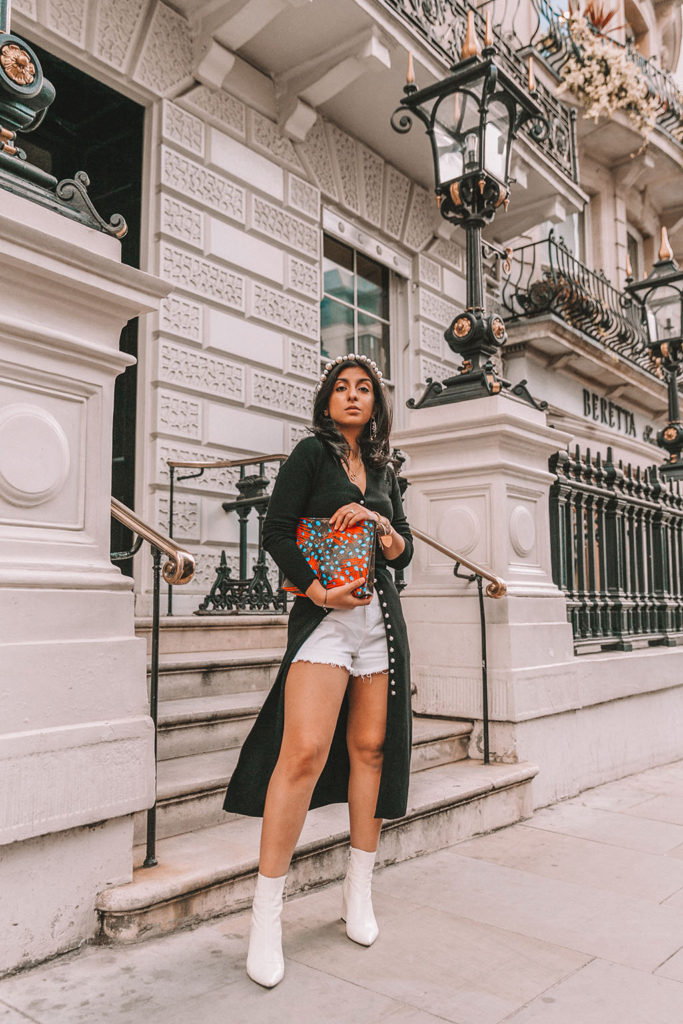 Luxury fashion blogger Shloka Narang of The Silk Sneaker shares a fall outfit in a knitted dress with pearl buttons for a parisian inspired look including & Other Stories, Louis Vuitton and Topshop