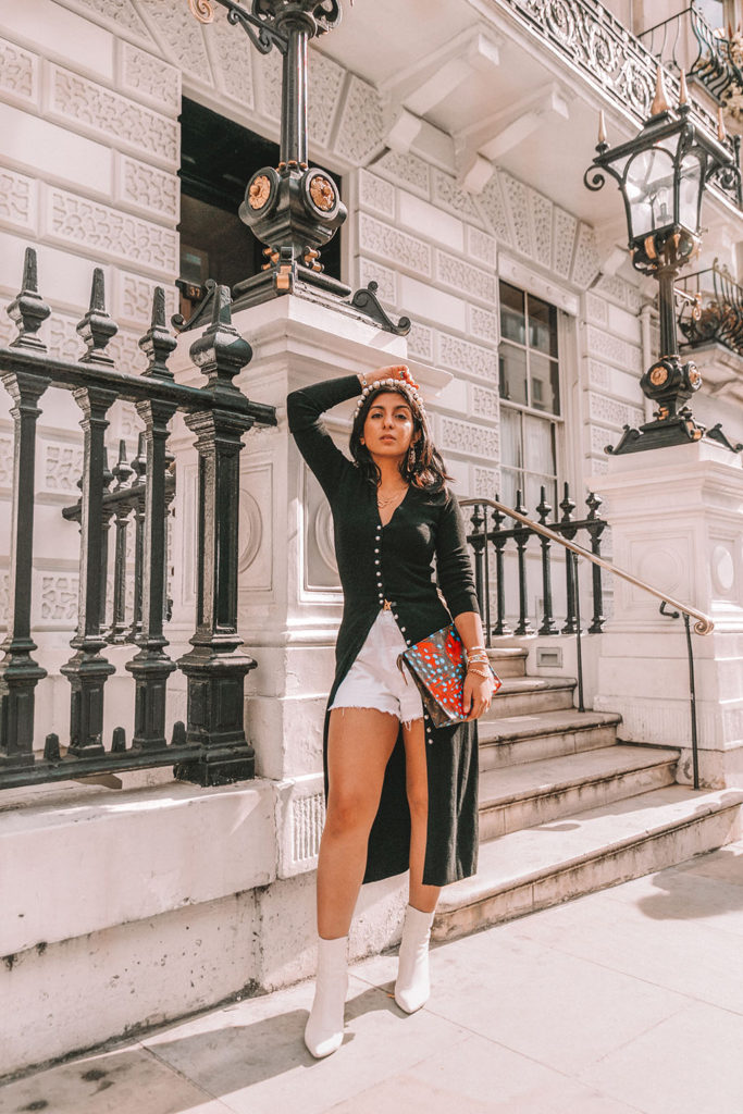 Luxury fashion blogger Shloka Narang of The Silk Sneaker shares a fall outfit in a knitted dress with pearl buttons for a parisian inspired look including & Other Stories, Louis Vuitton and Topshop