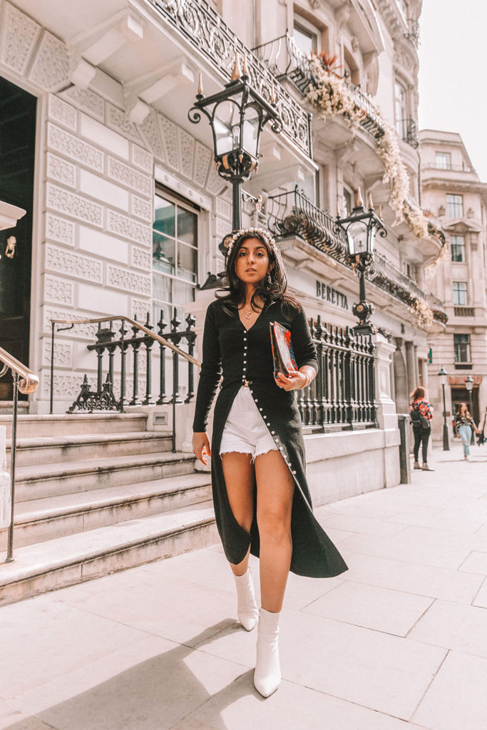 Luxury fashion blogger Shloka Narang of The Silk Sneaker shares a fall outfit in a knitted dress with pearl buttons for a parisian inspired look including & Other Stories, Louis Vuitton and Topshop