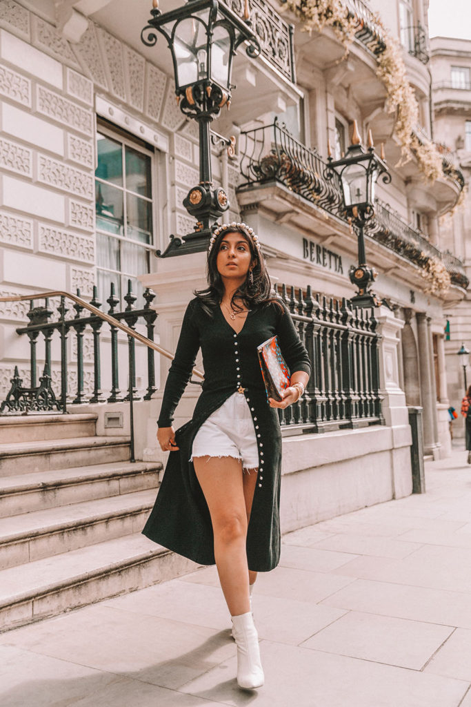 Luxury fashion blogger Shloka Narang of The Silk Sneaker shares a fall outfit in a knitted dress with pearl buttons for a parisian inspired look including & Other Stories, Louis Vuitton and Topshop