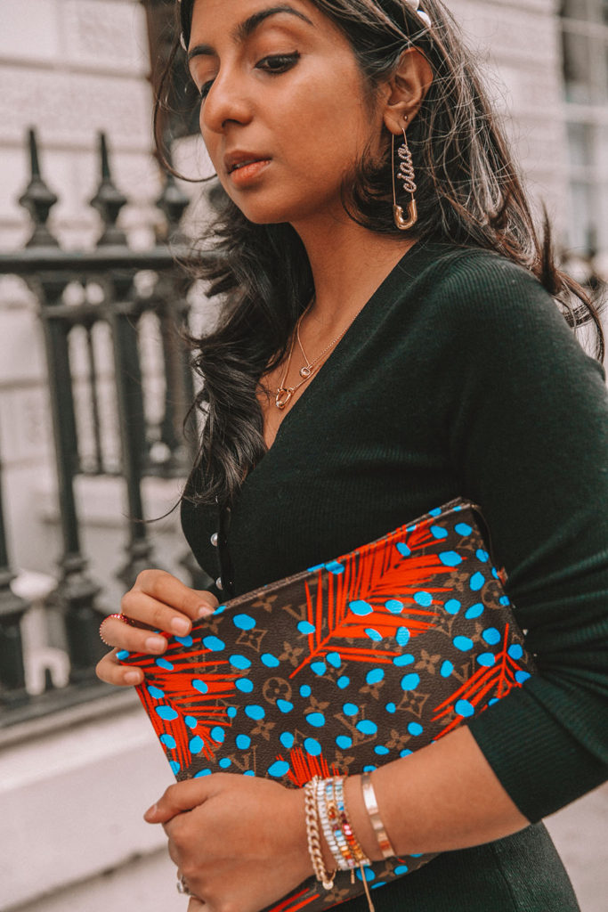 Luxury fashion blogger Shloka Narang of The Silk Sneaker shares a fall outfit in a knitted dress with pearl buttons for a parisian inspired look including & Other Stories, Louis Vuitton and Topshop