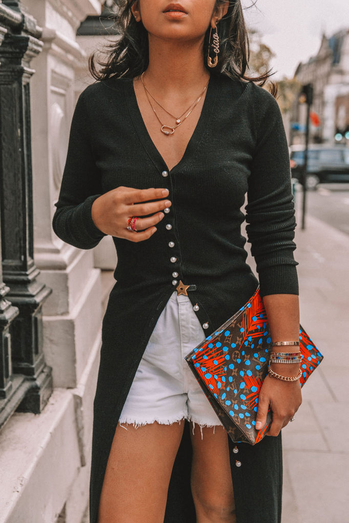 Luxury fashion blogger Shloka Narang of The Silk Sneaker shares a fall outfit in a knitted dress with pearl buttons for a parisian inspired look including & Other Stories, Louis Vuitton and Topshop