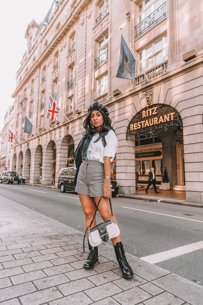 Luxury London fashion blogger Shloka Narang of The Silk Sneaker shares three fall outfit trends to wear before anyone else in biker boots, Sandro and Prada